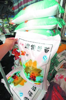 15公斤袋装米少装2公斤商家称虚标重量很普遍