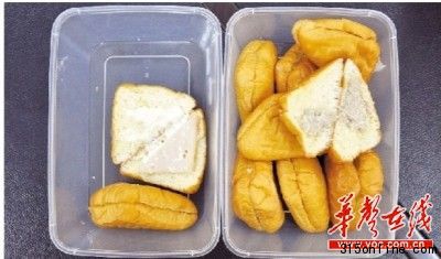 在8月8日泰国至长沙的航班上,旅客吃过后有不良反应的面包,面包盒上有多个标签,而且面包中的夹心部分看上去很不新鲜。傅聪 摄 在8月8日泰国至长沙的航班上,旅客吃过后有不良反应的面包,面包盒上有多个标签,而且面包中的夹心部分看上去很不新鲜。傅聪 摄
