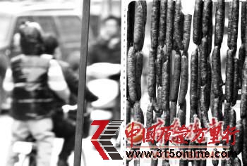 济宁城区的一家肉食店外,铁架上挂满了香肠。本报记者 李岩松 摄